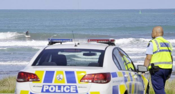 Police in Gisborne go to speak to surfers breaking lockdown rules. Photo / Gisborne Herald