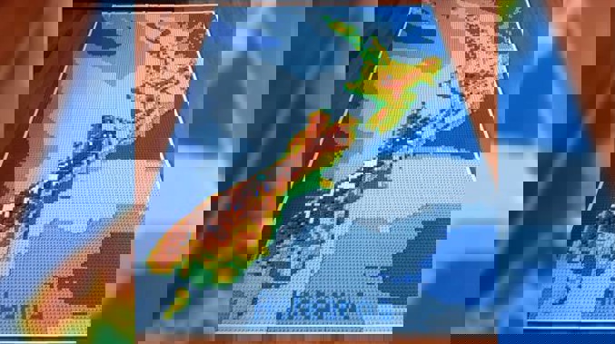 A data analyst's who spent months creating a mini version of a New Zealand map with Lego has revealed how he made the masterpiece possible. Photo / Alex Waleczek