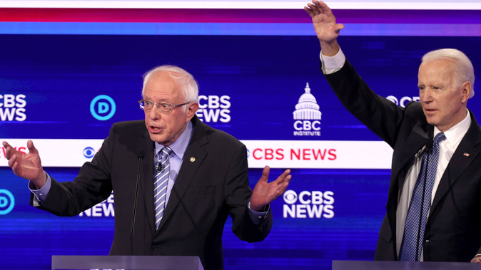 Bernie Sanders with Joe Biden in a debate. (Photo / AP)