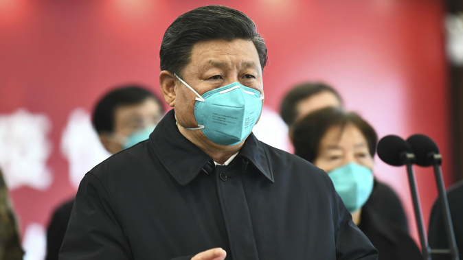 Chinese President Xi Jinping talks by video with patients and medical workers at the Huoshenshan Hospital in Wuhan in central China's Hubei Province. (Photo / via AP)