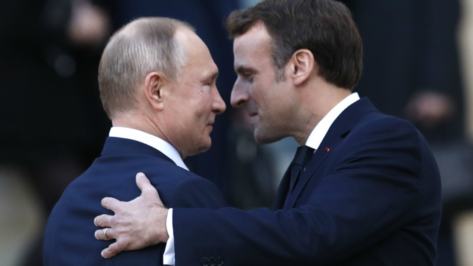 French President Emmanuel Macron, right, hopes Russian President Vladimir Putin will back his call. (Photo / AP)