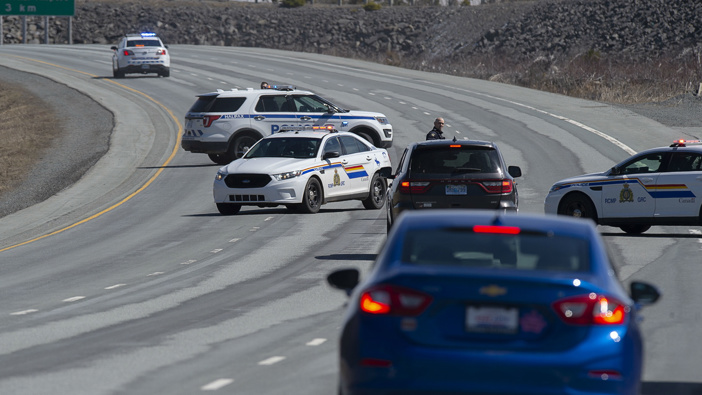 Canadian police on Sunday arrested a suspect in an active shooter investigation after earlier saying he may have been driving a vehicle resembling a police car. (Photo via AP)