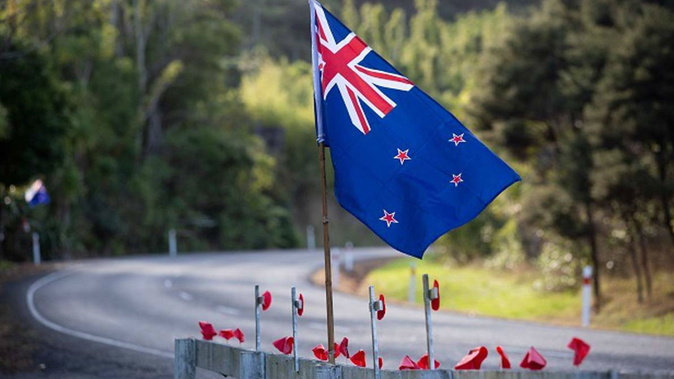 Fence decorations in the Waitakere Ranges, on Anzac Day. (Photo / Sylvie Whinray)