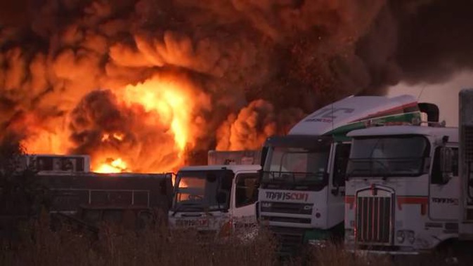 Firefighters are battling the blaze at a property on Weddons Rd in Rolleston. Photo / TVNZ