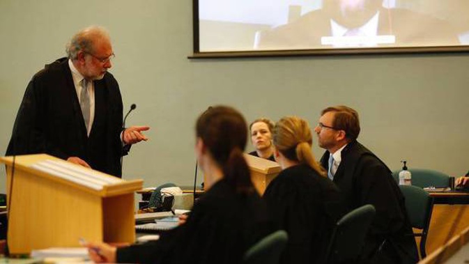 NZME lawyer Jack Hodder QC talks with Nine lawyer John Dixon QC. (Photo / Dean Purcell)