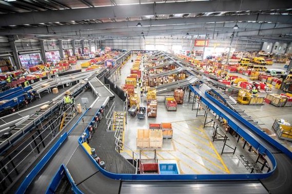 NZ Post's East Tamaki distribution centre. CourierPost is working through a huge backlog of parcels following the lockdown and subsequent move to online sales for many companies. Photo / Michael Craig