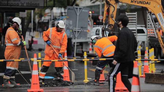Part of Auckland's Queen Street has been closed due to a burst water main. (Photo / Michael Craig)