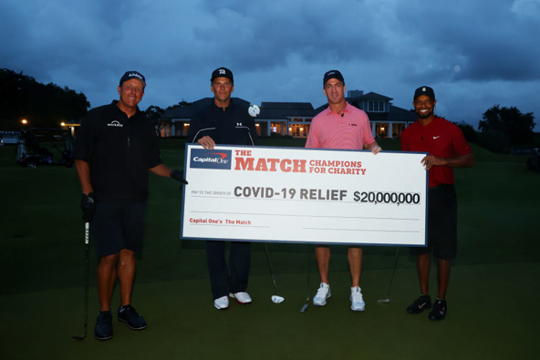 From left to right: Tim Mickelson, Tom Brady, Peyton Manning and Tiger Woods. (Photo / Getty)