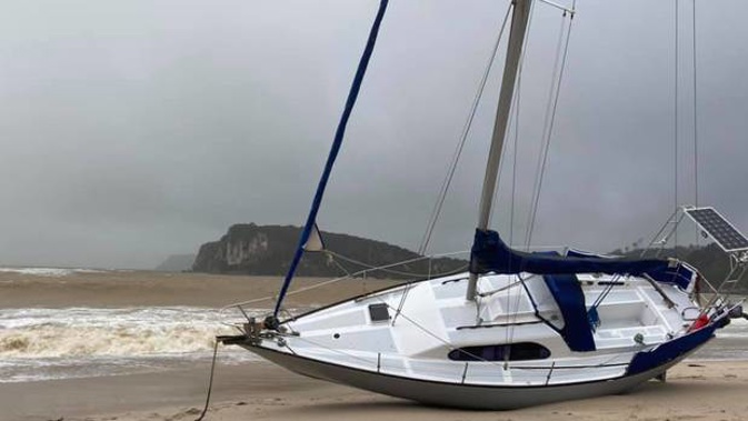 Yacht beached at Flaxmill Bay. Photo / Penny Yates, Cooks Beach Community Facebook group.