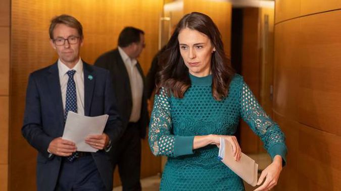 Jacinda Ardern did a little dance at the news the country was Covid free, while Ashley Bloomfield resisted and opted for a smile instead. Photo / Mark Mitchell