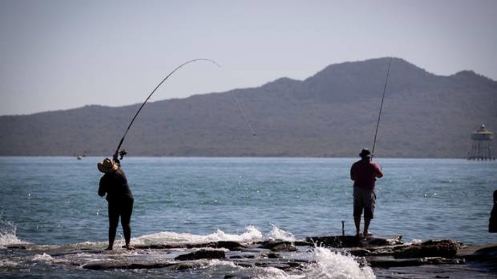 Recreational fishing is popular along the Auckland shorefront in the Hauraki Gulf. Photo / Dean Purcell