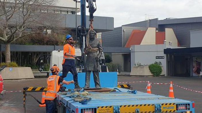 The statue of Captain John Fane Charles Hamilton being removed.