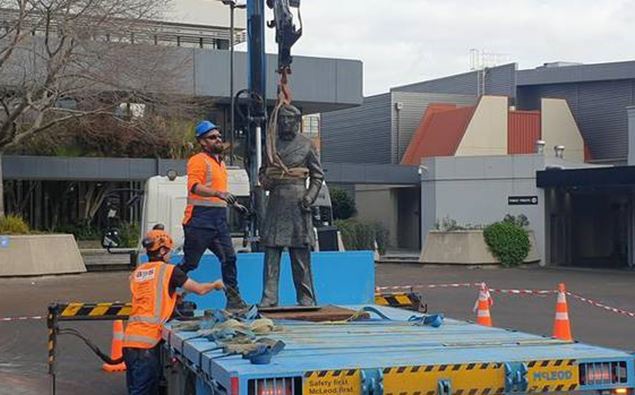 The statue of Captain John Fane Charles Hamilton being removed.
