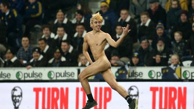 A streaker runs onto the field during the round 1 Super Rugby Aotearoa match between the Highlanders and Chiefs at Forsyth Barr Stadium. Photo / Getty Images