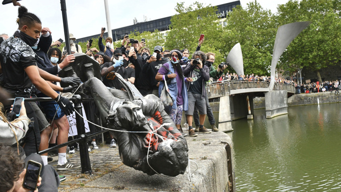 The statue of Edward Colson was toppled in Bristol. (Photo / AP)