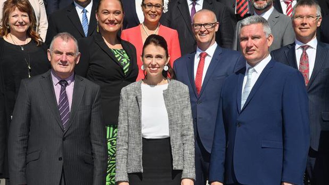 Prime Minister of New Zealand Jacinda Ardern with MP's Trevor Mallard and Kelvin Davis in front of Parliament. Photo / Marty Melville