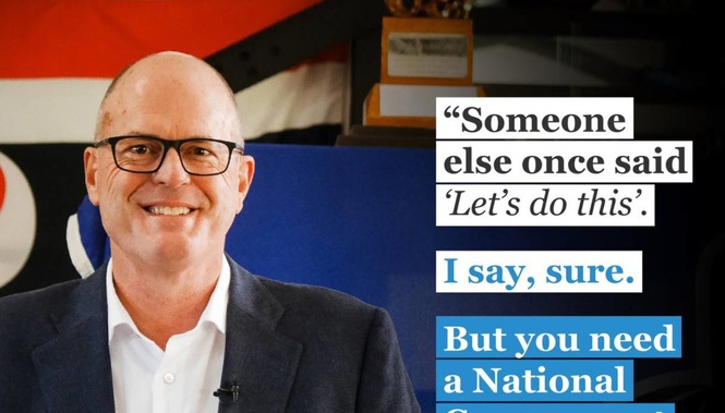 Todd Muller's latest gaffe saw him stand behind an upside down flag. (Photo / National Party)