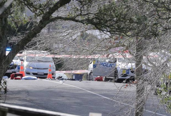 An officer has died after two police were shot in West Auckland. Photo / Michael Craig