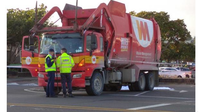 A section of Glendale Rd is closed in Glen Eden after a serious crash involving a Waste Management rubbish truck and a person.