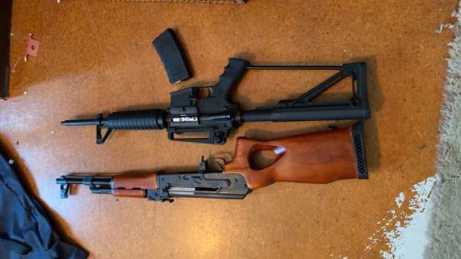 Some of the firearms found during the raids.