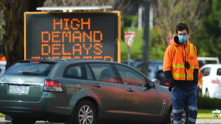 Traffic management is seen outside a COVID-19 testing facility at Northland shopping centre in Melbourne. (Photo / AAP)
