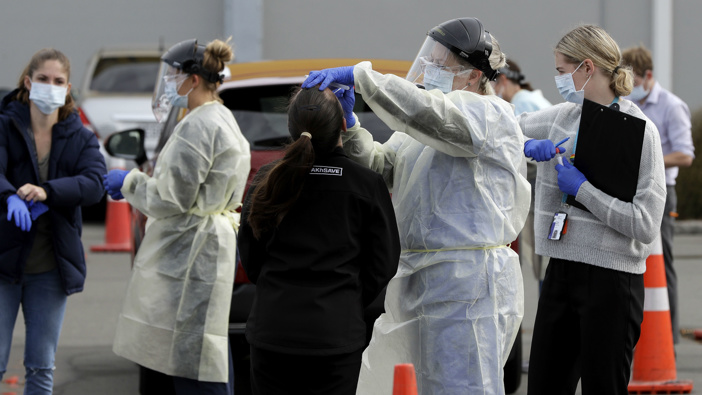 New Zealanders being tested for Covid-19. (Photo / AP) 