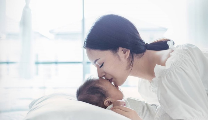 Paid parental leave will be extended to 26 weeks from July 1. Campaigners say that's worth celebrating, but New Zealand's paid leave is still low by international standards. Photo / 123rf