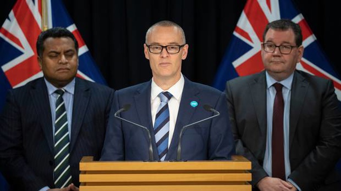 David Clark, flanked by Cabinet colleagues Kris Faafoi and Grant Robertson, announced his resignation as Health Minister this morning. Photo / Mark Mitchell