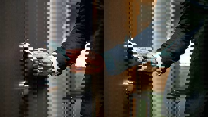 It's said guards would come into frequent contact with those quarantined and would share lifts with returnees. Photo / 123RF