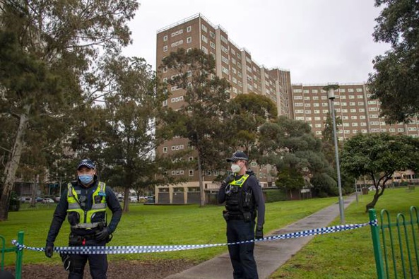 Police guard access to housing commission apartments under lockdown in Melbourne, Australia. Photo / AP