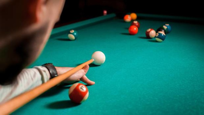 A man needed bowel surgery after allegedly being attacked with a pool cue while naked. Photo / 123RF