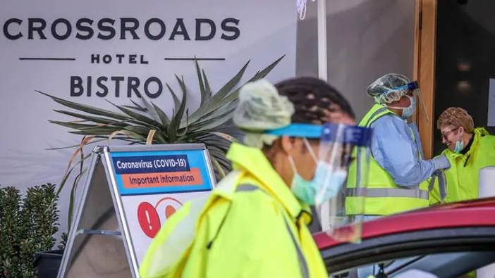 Medical staff perform tests on drivers outside the Crossroads Hotel, in the Sydney suburb of Casula. (Photo / Getty)