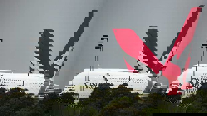 Two Qantas planes sit outside its hanger at the Los Angeles International Airport in Los Angeles. (Photo / AP)