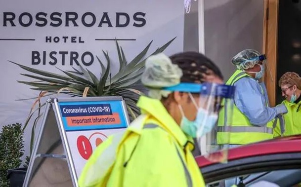 Medical staff perform tests on drivers outside the Crossroads Hotel, in the Sydney suburb of Casula. (Photo / Getty)