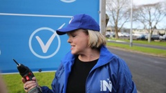Judith Collins after helping put up a new election billboard today. Photo / Sylvie Whinray