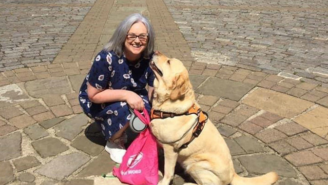 Sarah Nathan with her dog. (Photo / Supplied)
