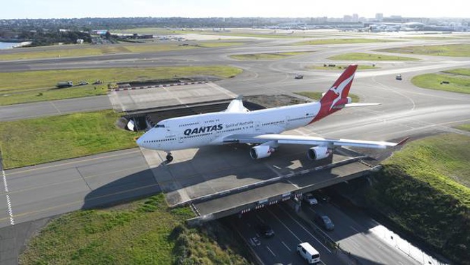 A Qantas Boeing 747-400, registration VH-OEJ taxis at Sydney Airport for the last time as it retires from service on July 22, 2020 in Sydney. Photo / Getty)