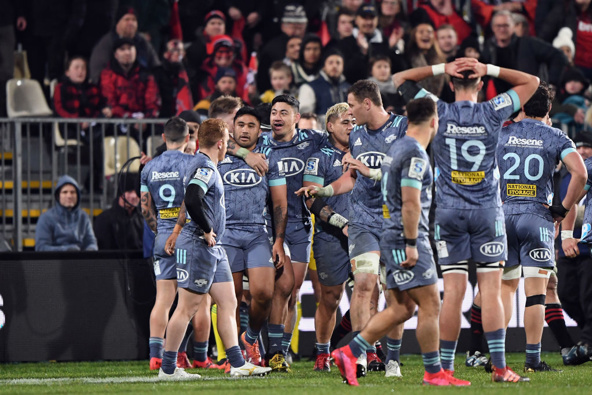 The Hurricanes celebrate their historic win over the Crusaders. (Photo / Getty)