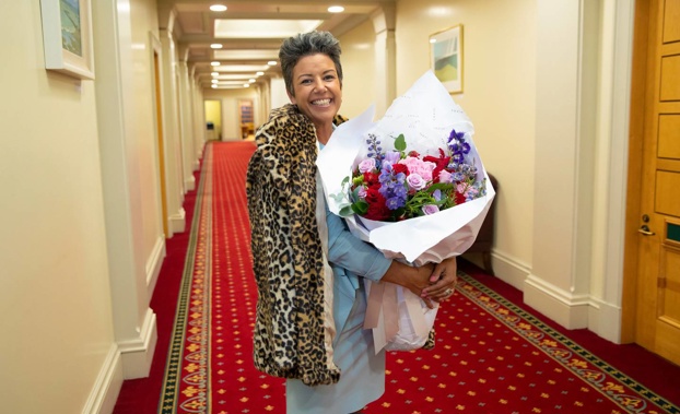 Paula Bennett in April 2019 with flowers from Simon Bridges for her 50th birthday. (Photo / Mark Mitchell)