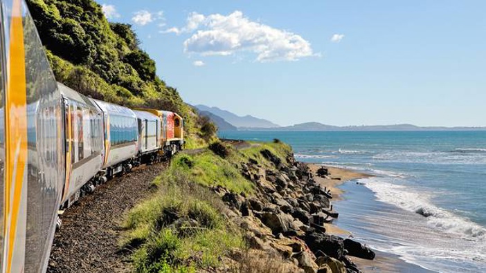 The Coastal Pacific rail service passenger train on the Kaikoura coast. Photo / Supplied