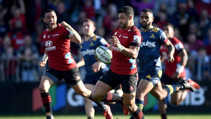 Richie Mo'unga of the Crusaders runs in to score a try. Photo / Getty