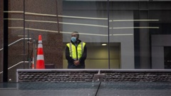 Security at the Crowne Plaza Hotel in central Auckland, used as a Covid-19 managed isolation facility. Photo / Sylvie Whinray