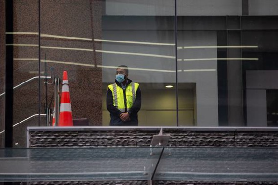 Security at the Crowne Plaza Hotel in central Auckland, used as a Covid-19 managed isolation facility. Photo / Sylvie Whinray