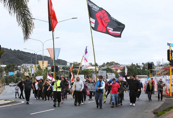 Protesters walk down Dent St in Whangārei. Photo / Tania Whyte
