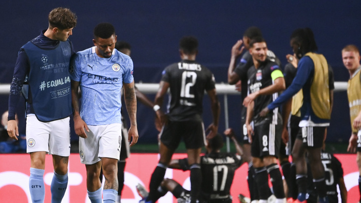Manchester City's Gabriel Jesus is consoled by teammate John Stones, left, after their loss in the Champions League quarterfinal match. (Photo / AP)