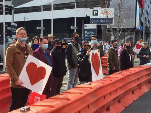 People gathered outside court this morning. Photo / Amber Allott