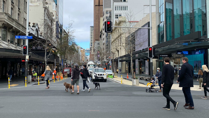 Auckalnders out on Queen Street. (Photo / Courtney Winter)