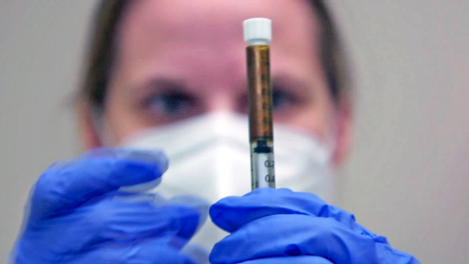 When a coronavirus vaccine comes on the market, people will likely need two doses, not just one -- and that could cause real problems. (Photo / CNN)