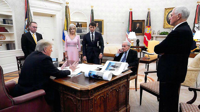 n this White House photo from December 2019 provided by Bob Woodward, President Donald Trump is seen speaking to Woodward in the Oval Office. (Photo / White House via CNN)