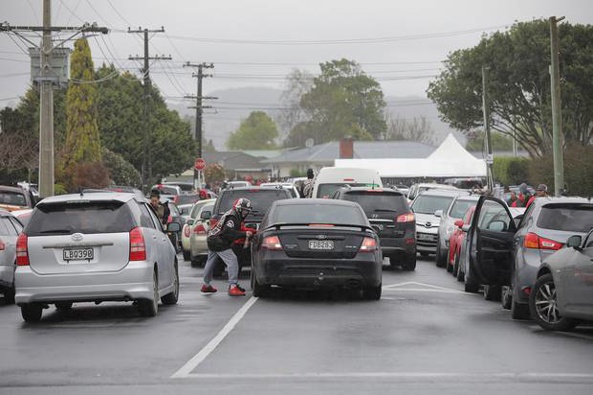 A large convoy congregated in Auckland for the tangihanga of a gang member, despite alert level 2 restrictions that prohibit more than 50 people attending. Photo / Peter Meecham